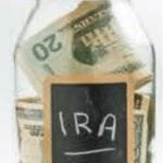 Money in a jar with IRS on it