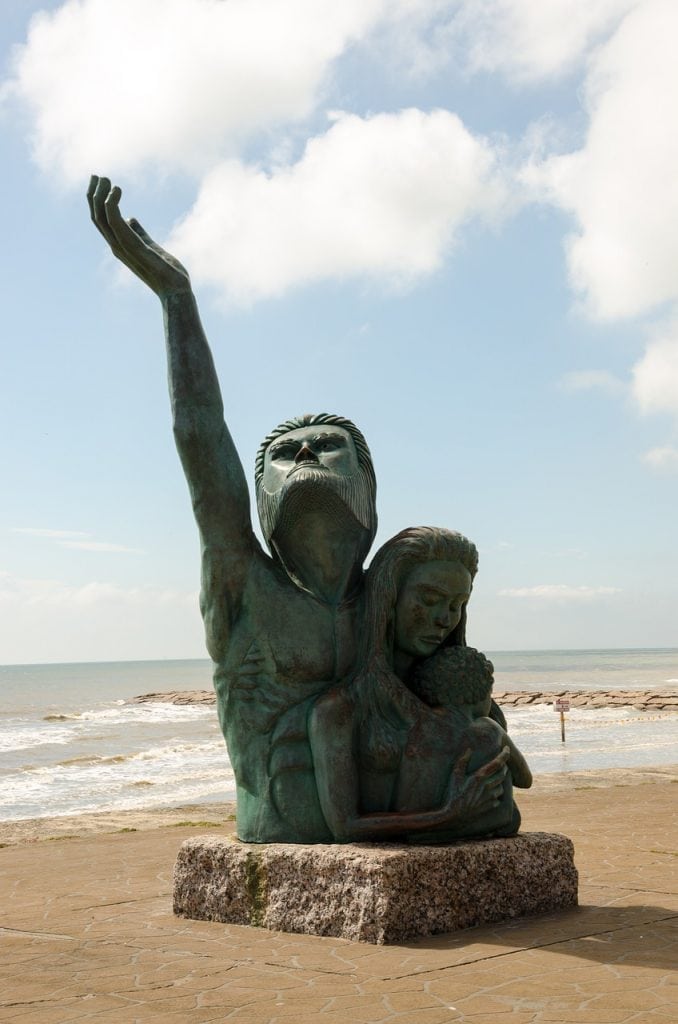 Statue of man, woman and child